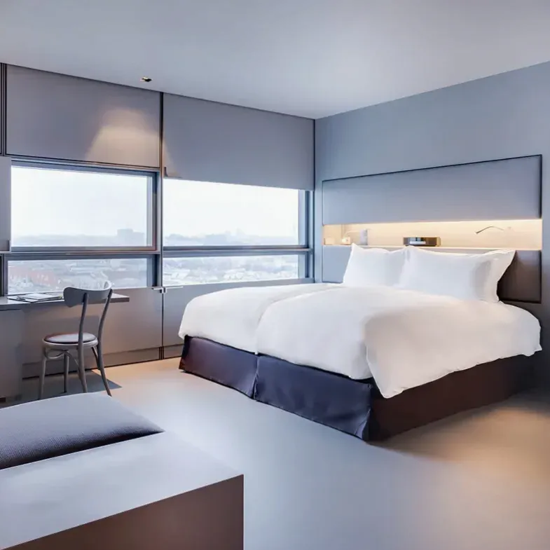 Junior suite with elegant lounge area and refined finishes